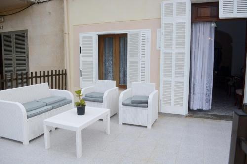 Фотография гостевого дома 2 bedrooms house at Can Picafort 500 m away from the beach with city view furnished terrace and wifi