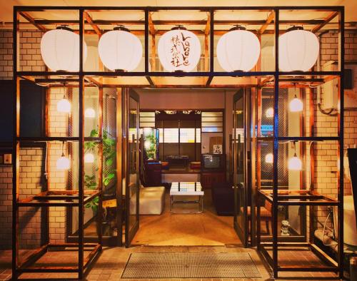 Фотография гостевого дома 泊まれる図書館 寄処 -yosuga-