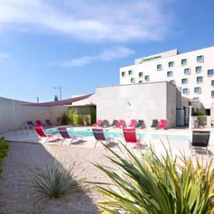 Фотографии гостиницы 
            Holiday Inn Express Montpellier - Odysseum, an IHG Hotel