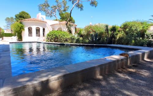 Фотографии гостевого дома 
            Villa Dos Calas - Bonita casa de estilo rustico y piscina de agua salada