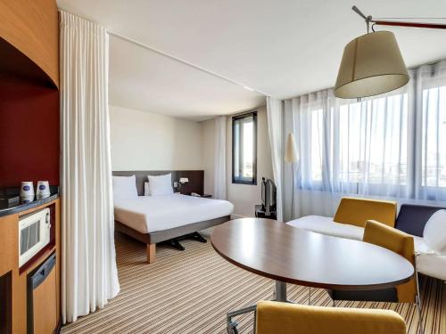 Фотография гостиницы Novotel Suites Paris Nord 18ème
