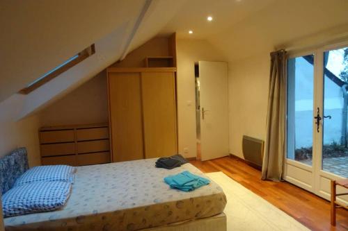 Фотография гостевого дома Ty Gwenn, dans un parc boisé, la plage à vos pieds