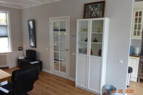 Фотография гостевого дома Stadswoning voor jonge gezinnen en senioren