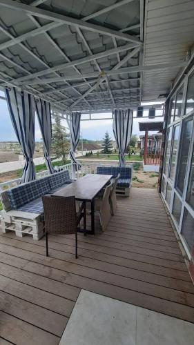 Фотография гостевого дома Отдых на Иссык-Куле в комфортабельном коттедже, Киргизия