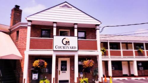 Фотография мотеля Central Motel Courtyard