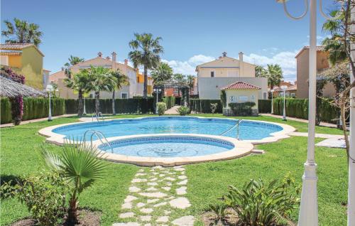 Фотографии гостевого дома 
            Nice home in Oliva w/ WiFi, Outdoor swimming pool and 2 Bedrooms