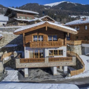 Фотография гостевого дома Chalet by the Skiing Area in Neukirchen with Sauna