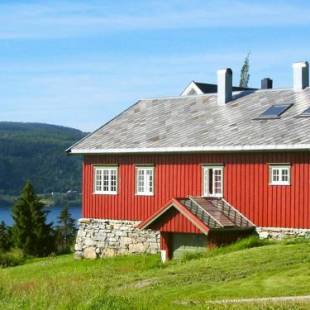 Фотографии гостевого дома 
            Four-Bedroom Holiday home in Follafoss