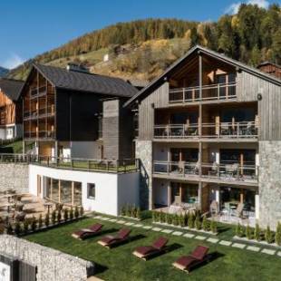 Фотографии апарт отеля 
            Les Dolomites Mountain Lodges