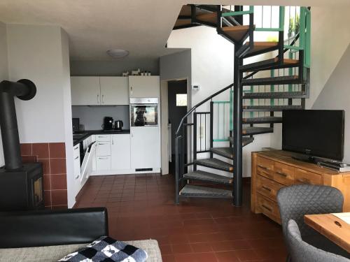 Фотография гостевого дома Ferienhäuser Schlossberg