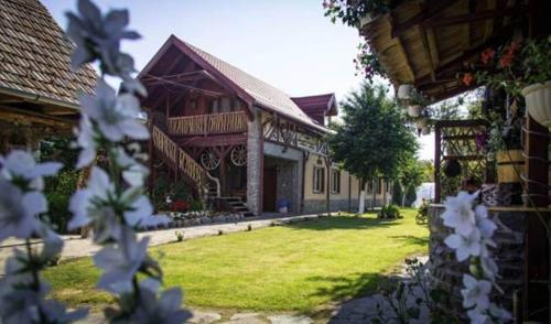 Фотография гостевого дома Pensiunea Dealu Morii