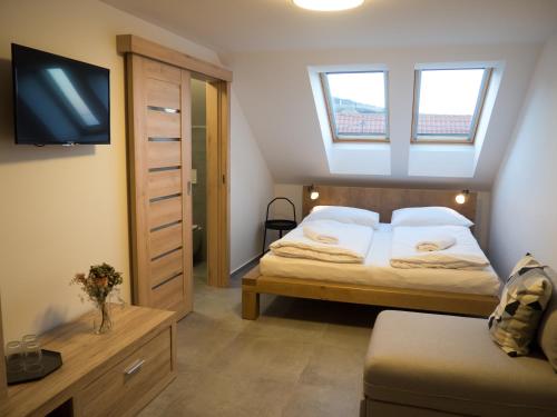 Фотографии гостевого дома
Restaurace - Apartmány Bobule