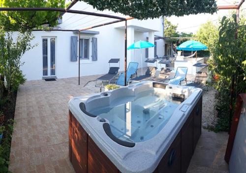 Фотография гостевого дома Holiday Home Dioniza