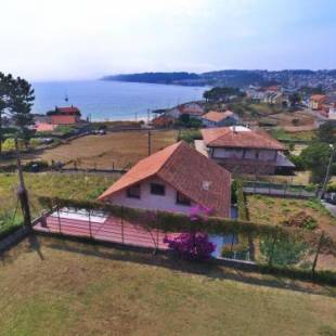 Фотографии гостевого дома 
            Casa O Portiño