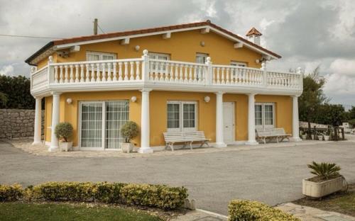 Фотография гостевого дома Chalet Robayera a línea de playa