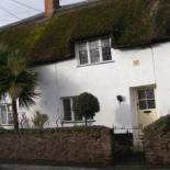 Фотография гостевого дома Tudor Thatch Cottage