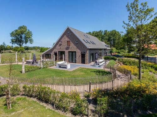 Фотография гостевого дома Lush Mansion in Vrouwenpolder with Private Fenced Garden