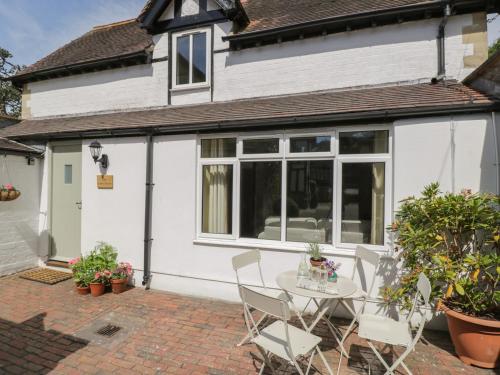 Фотография гостевого дома The Coach House