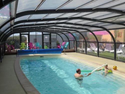 Фотография кемпинга Camping Les P'tites Maisons dans la Prairie