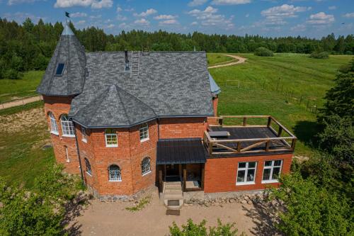 Фотография гостевого дома Замок в лесу