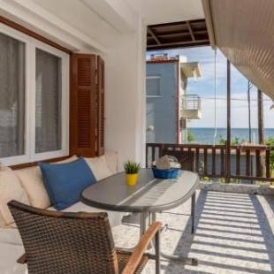 Фотографии гостевого дома 
            Chalkidiki Beachfront Apartment