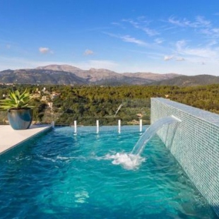 Фотография гостевого дома spectacular villa with breathtaking view large pool in Buger Mallorca