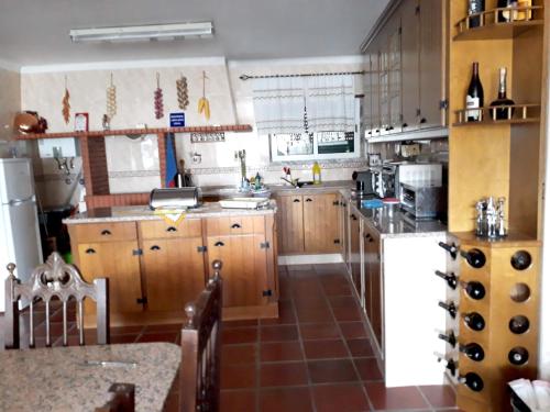 Фотография гостевого дома 3 bedrooms house with furnished garden and wifi at Encarnacao 1 km away from the beach