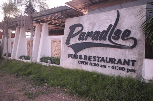 Фотографии гостевого дома 
            Paradise Inn and Dining