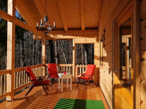 Фотография гостевого дома Blockhaus Chalet mit Infrarotsauna und Schlafboden