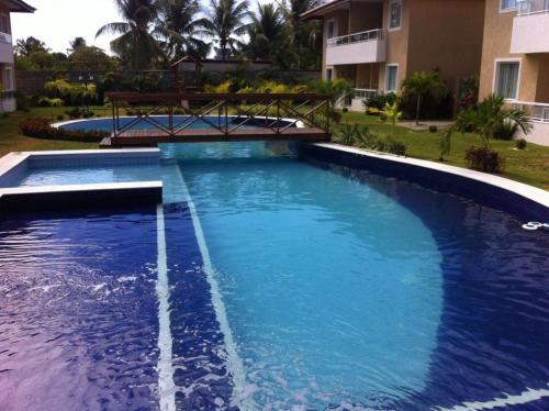 Фотография гостевого дома Village Guarajuba Verano Residencial Térreo C05 - área churrasqueira particular