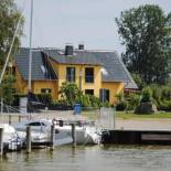 Фотография гостевого дома Ferienhaus am kleinen Hafen