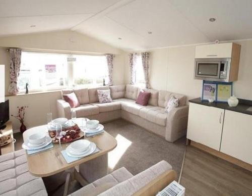 Фотография гостевого дома Haven Devon Cliffs - Karo Place