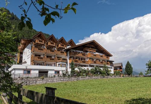 Фотография гостиницы Wellness & Spa Hotel Alpenland
