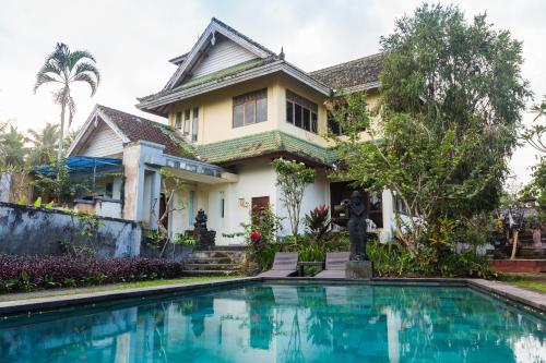 Фотографии гостиницы 
            OYO 90640 Agung Kartini Villa