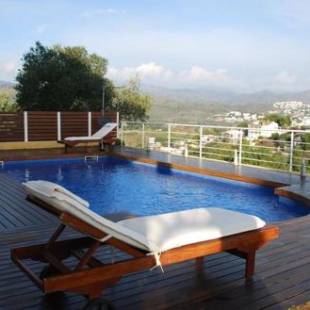 Фотографии гостевого дома 
            4 bedrooms villa at Llanca 300 m away from the beach with city view private pool and enclosed garden