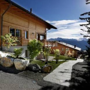 Фотографии гостевого дома 
            Crans Luxury Lodges