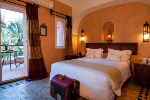 Фотографии гостевого дома 
            Double room in a charming villa in the heart of Marrakech palm grove