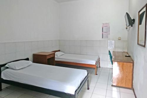 Фотография гостиницы SPOT ON 2865 Sartika Inn Pati