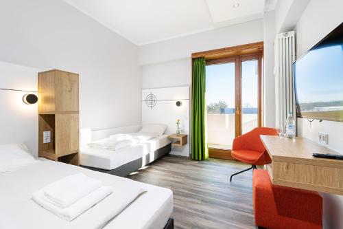 Фотография гостиницы Hotel Olympia Schießanlage