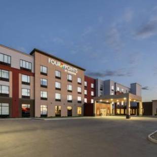 Фотографии гостиницы 
            Four Points by Sheraton Grande Prairie