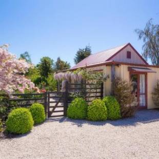 Фотографии гостевого дома 
            Tasman Village Cottage