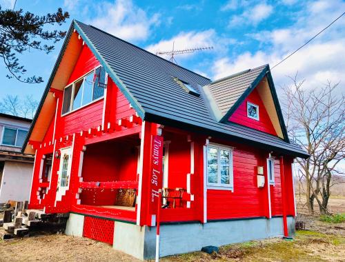 Фотографии гостевого дома 
            Tomy's Log House in the Wood - Need Own CAR 需要自驾游