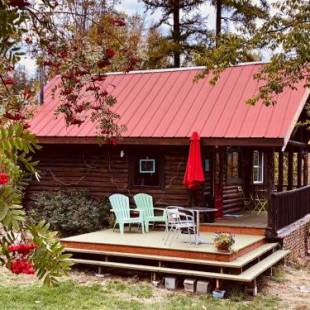 Фотографии гостевого дома 
            Morning Star Log Cabin