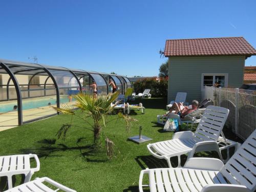 Фотография гостевого дома Chalet Les P'tites Maisons dans la Prairie