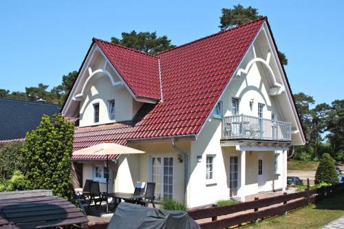 Фотографии гостевого дома 
            Semi-detached house Bernsteinhaus II Trassenheide - DOS08164-L