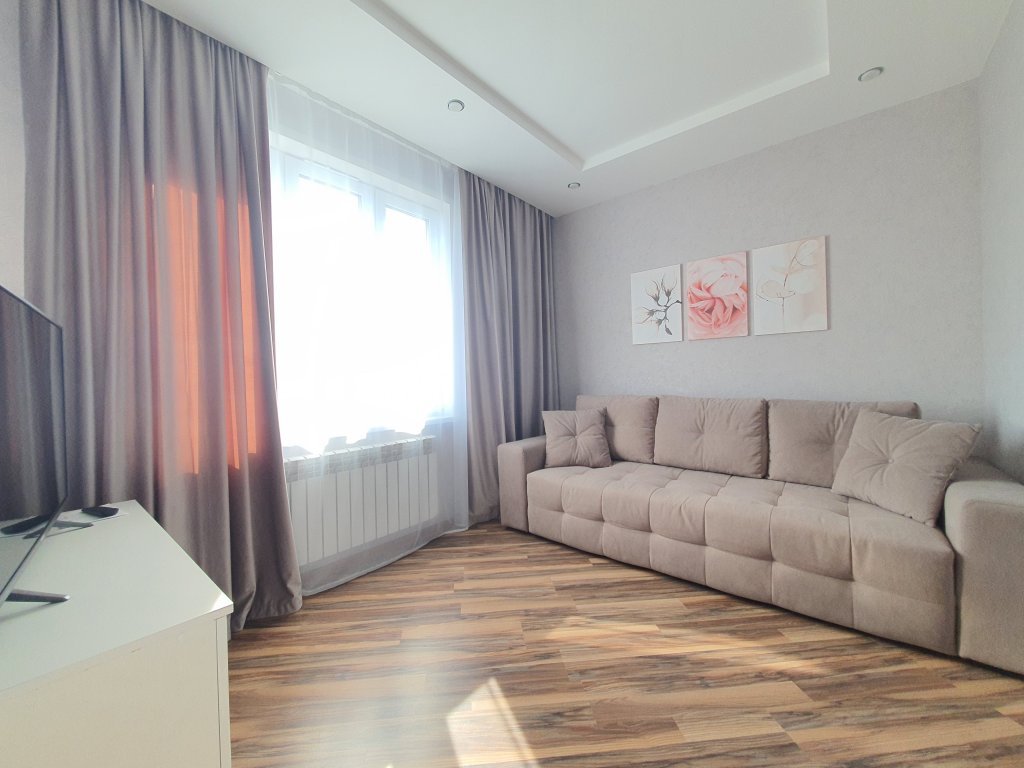 Фотография квартиры Апартаменты Живи Уютно в Высотке