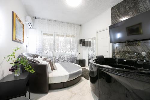 Фотографии гостиницы 
            Gregorio VII Luxury Suites San Damaso