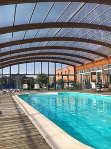 Фотография гостиницы The Originals Boutique Hôtel Spa Beuzeville Honfleur Sud