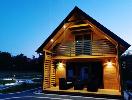 Фотография гостевого дома Domki przy plaży