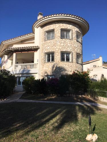 Фотография гостевого дома Villa frente al Mar